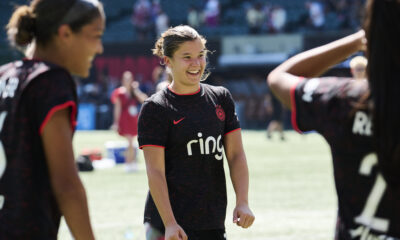 Pietra Tordin celebrates with her teammates after the Portland Thorns' victory over the Seattle Reign in Portland, OR on August 10, 2025.